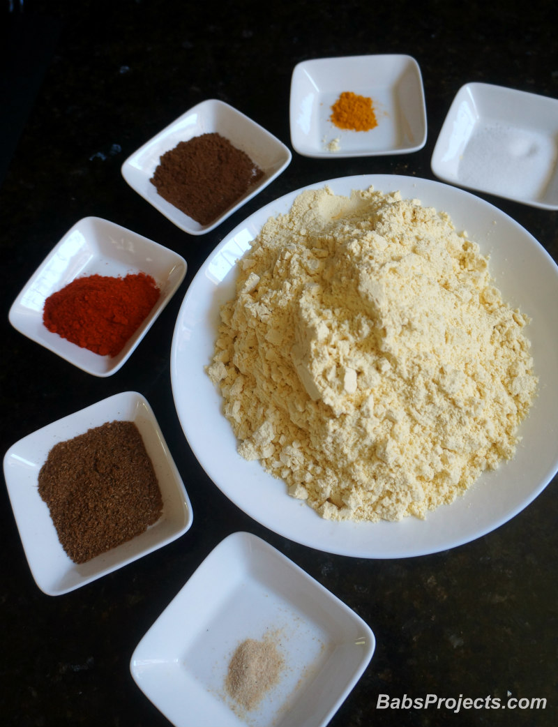 Ingredients for Kara Kaddhi Placed in Individual White Bowls